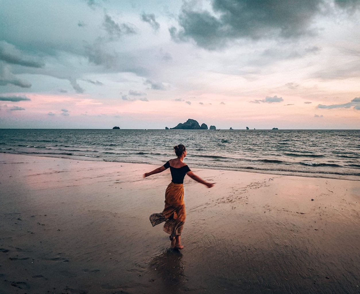 Image of girl on Ao Nang beach during sunset