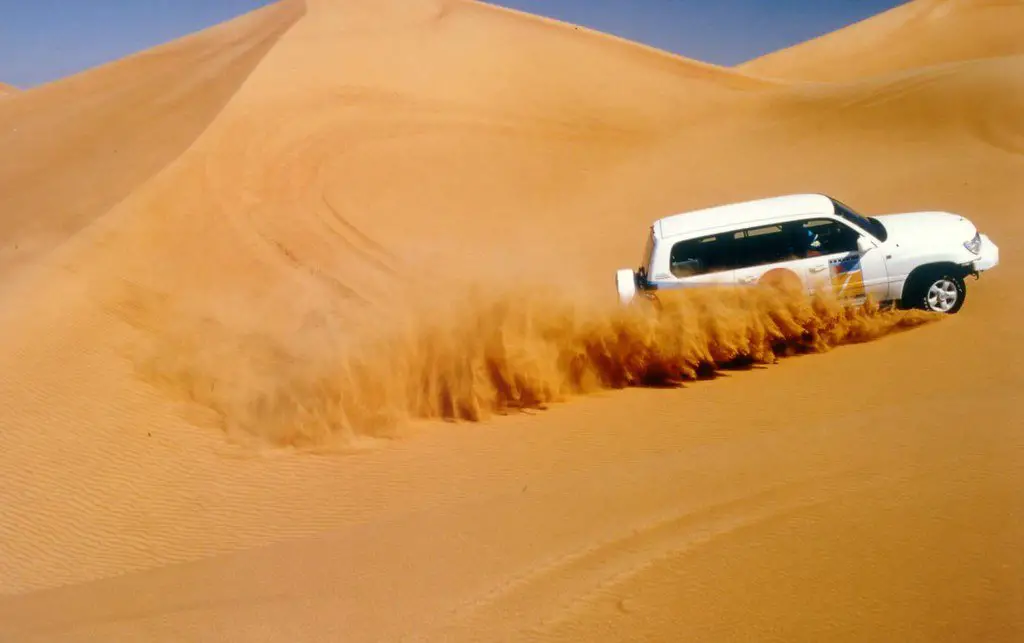 Image of a car in a desert safari in Dubai