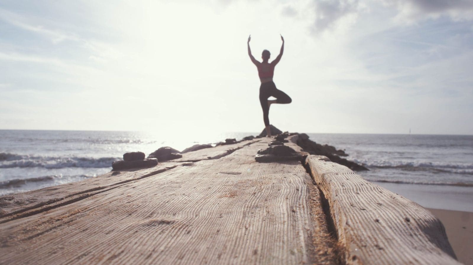 Yoga pose by the seaside